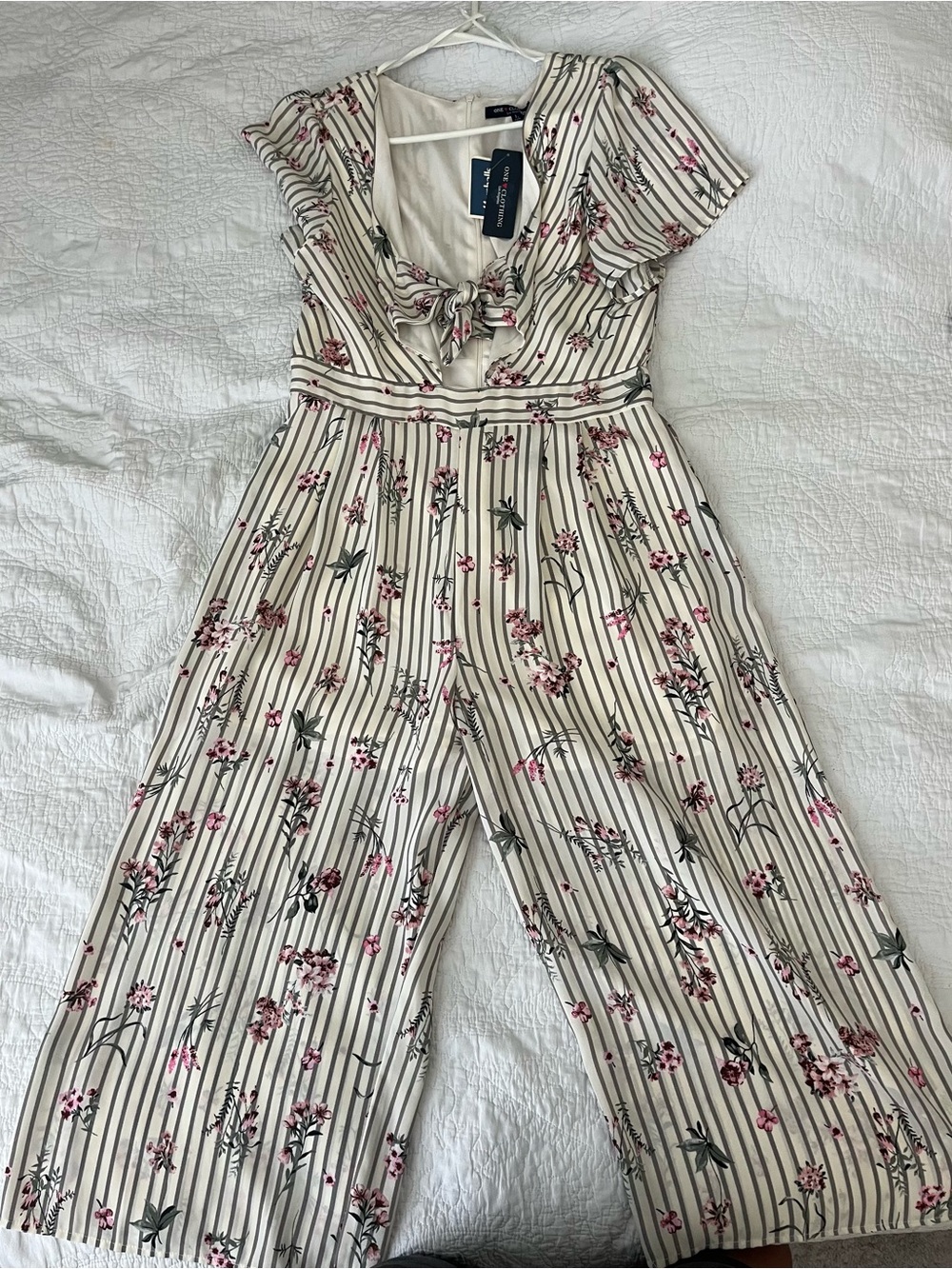 one ❤️ clothing Cream Striped Jumpsuit with Pink Floral Print